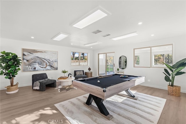 rec room featuring a wealth of natural light, pool table, and light hardwood / wood-style floors