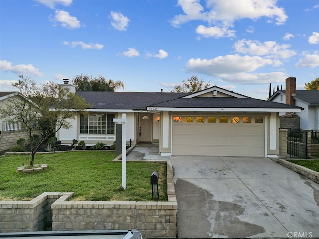 single story home with a front lawn and a garage