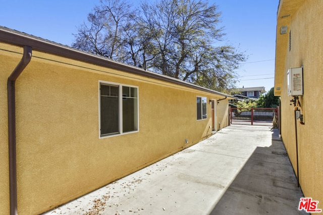 view of home's exterior featuring a patio