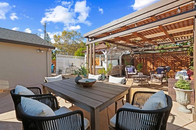 view of patio with a pergola and an outdoor hangout area