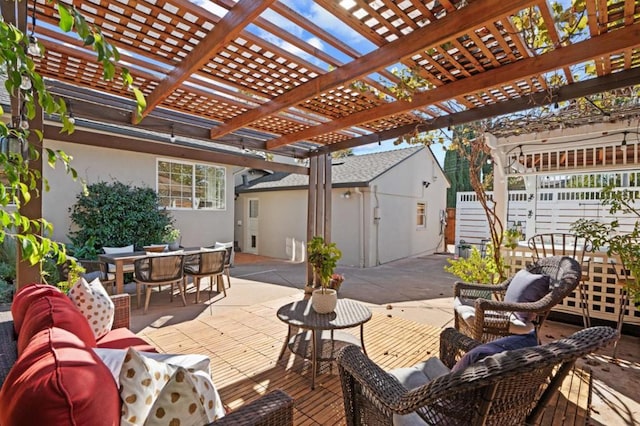 view of patio featuring an outdoor hangout area and a pergola