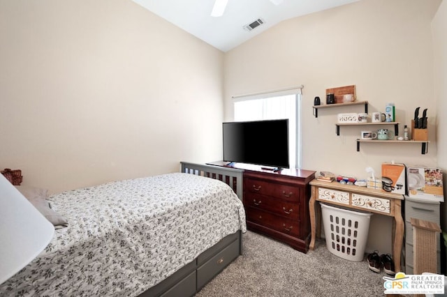 carpeted bedroom featuring ceiling fan and lofted ceiling