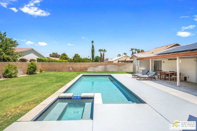 view of swimming pool with an outdoor hangout area, a patio area, a yard, and an in ground hot tub