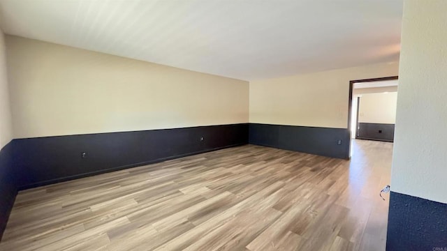 empty room with light wood-type flooring