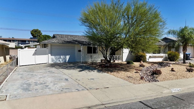 ranch-style home featuring a garage