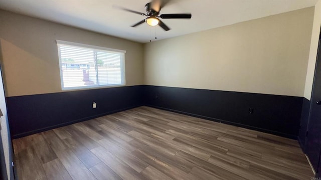 spare room featuring ceiling fan and hardwood / wood-style floors