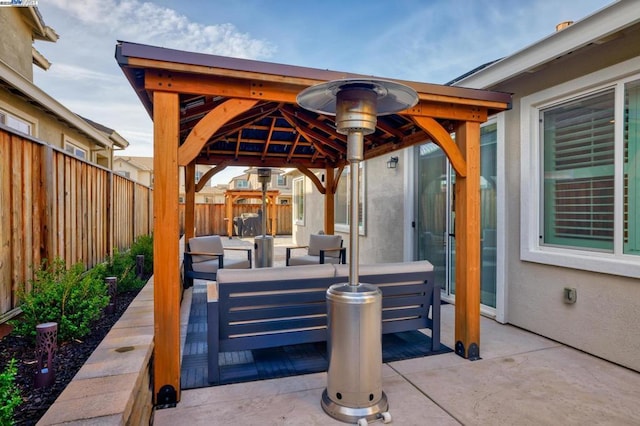 view of patio / terrace featuring an outdoor hangout area and a gazebo