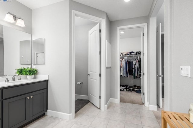 bathroom featuring tile patterned floors and vanity