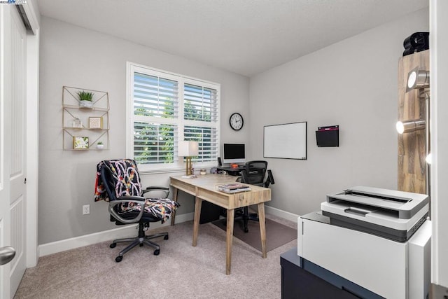 view of carpeted office space