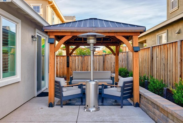 view of patio with a gazebo and outdoor lounge area