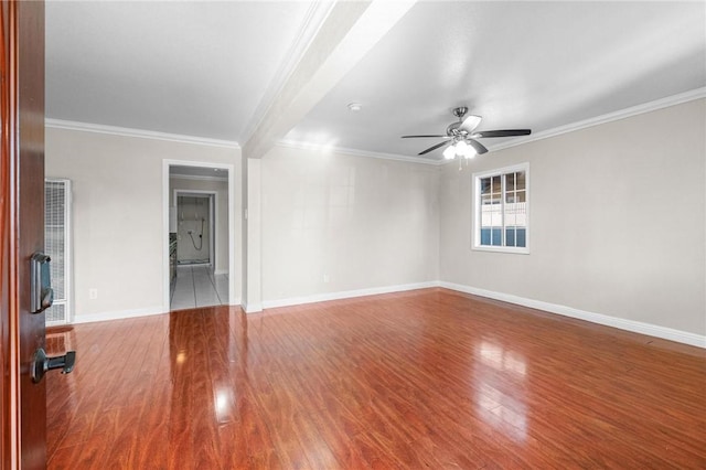 unfurnished room featuring ceiling fan, ornamental molding, and hardwood / wood-style flooring