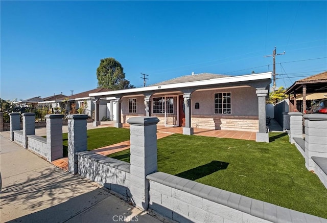 view of front of property with a front lawn