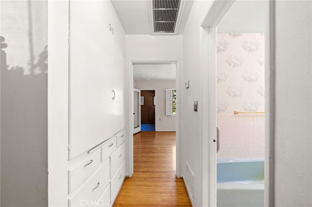 hall featuring light hardwood / wood-style flooring