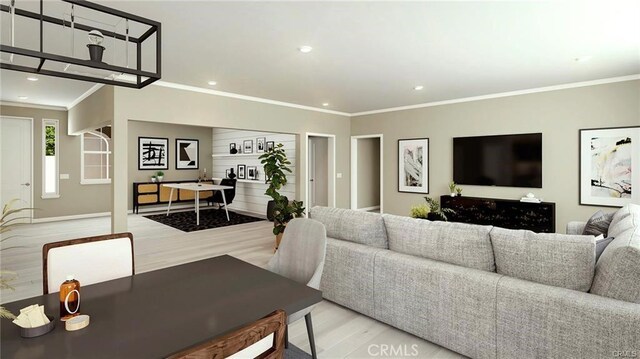 living room featuring light hardwood / wood-style flooring and ornamental molding