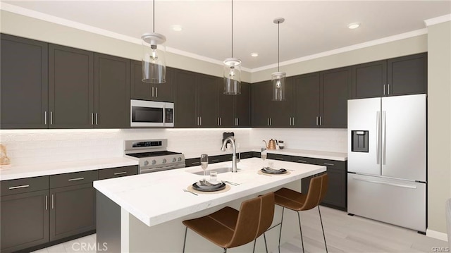 kitchen featuring pendant lighting, range, white refrigerator with ice dispenser, sink, and a center island with sink