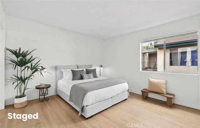 bedroom featuring wood-type flooring