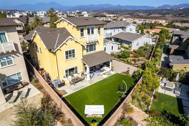 drone / aerial view featuring a mountain view