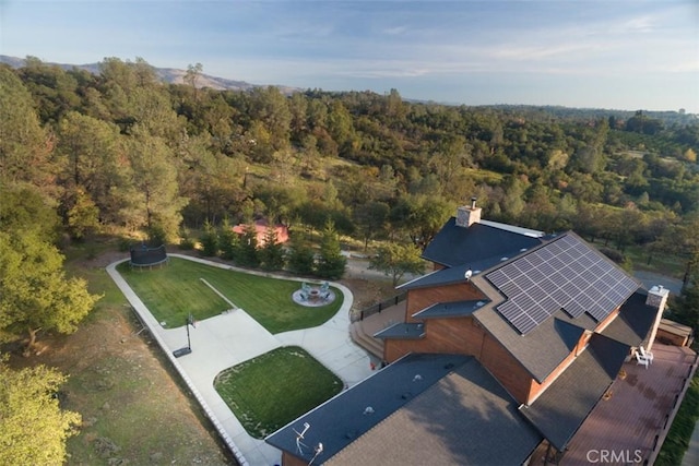 bird's eye view with a view of trees