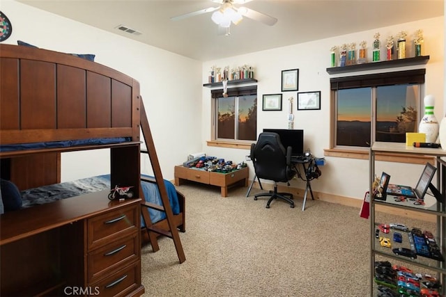 bedroom with light carpet, baseboards, visible vents, and ceiling fan