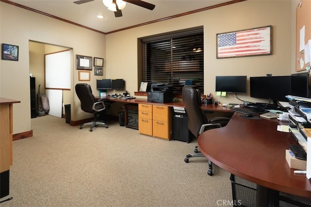 office space featuring recessed lighting, light colored carpet, a ceiling fan, baseboards, and crown molding