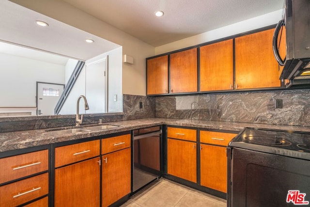 kitchen featuring stainless steel dishwasher, decorative backsplash, sink, range with electric cooktop, and light tile patterned floors