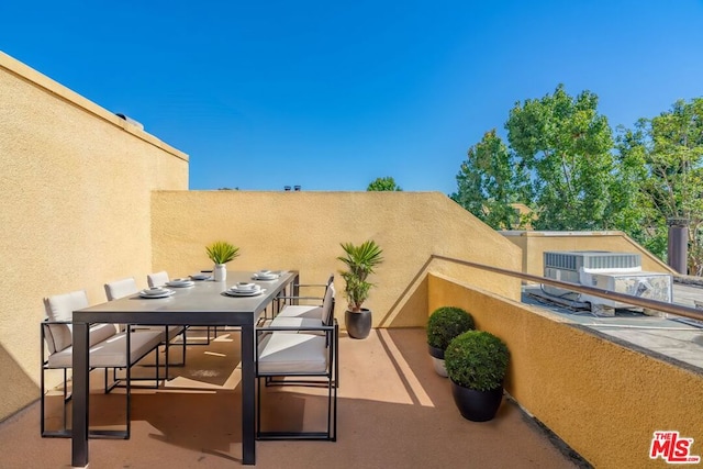 view of patio with a balcony