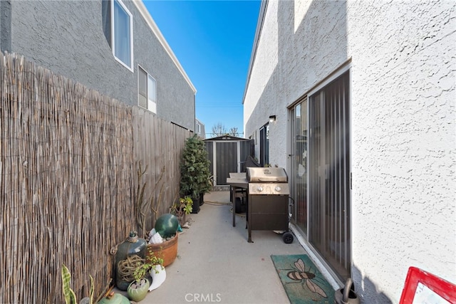 view of side of property featuring a patio