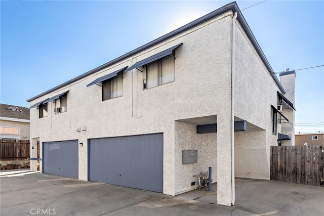 view of home's exterior featuring a garage