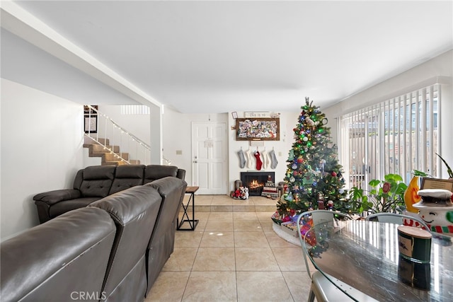 living room with light tile patterned flooring