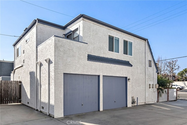 view of property exterior with a garage