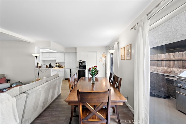 dining room featuring dark wood-type flooring