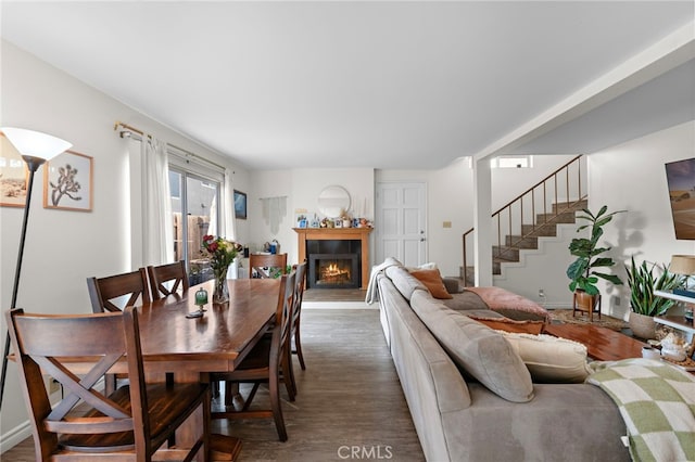 dining area featuring dark wood-type flooring