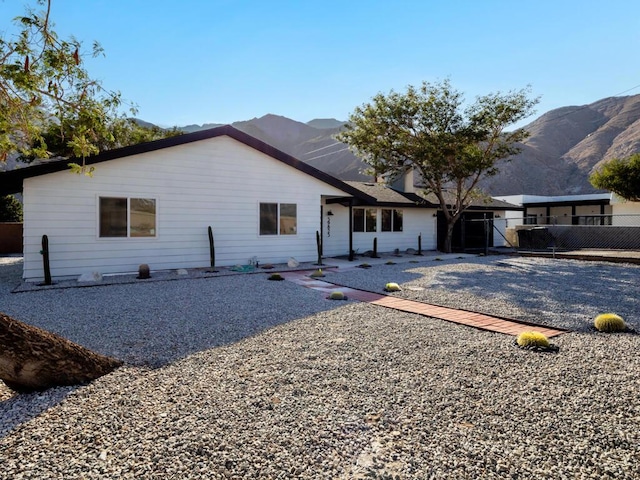 ranch-style house with a mountain view