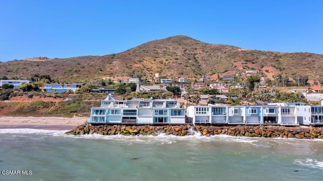 property view of mountains featuring a water view