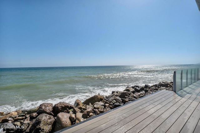 view of water feature with a beach view