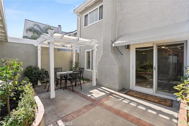 view of patio / terrace featuring a pergola