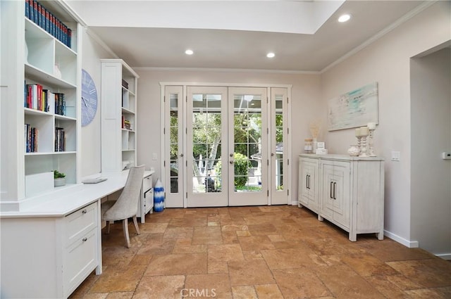 doorway to outside featuring french doors, crown molding, built in desk, recessed lighting, and stone tile flooring