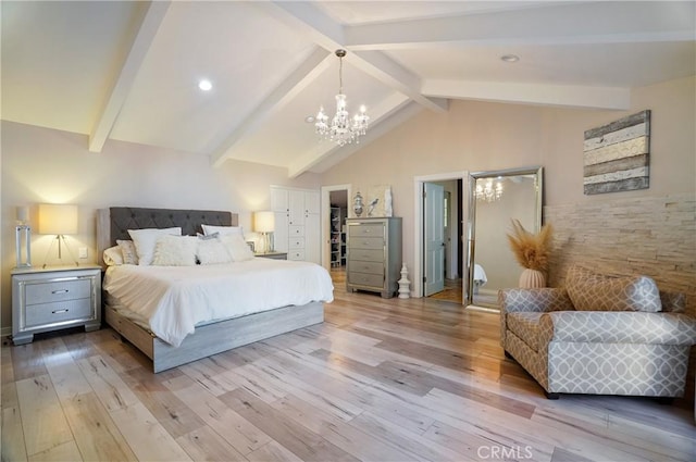 bedroom with high vaulted ceiling, a spacious closet, light wood-type flooring, beamed ceiling, and an inviting chandelier