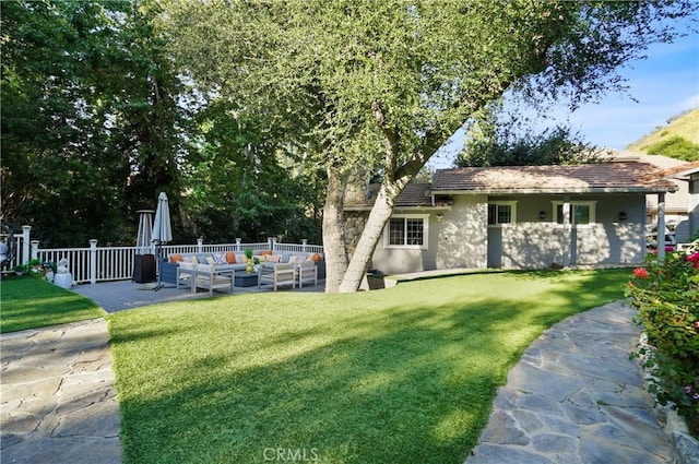 view of yard with a patio and an outdoor living space