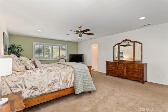 bedroom with ceiling fan and carpet floors