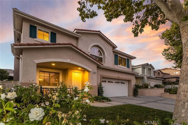 view of front of property with a garage