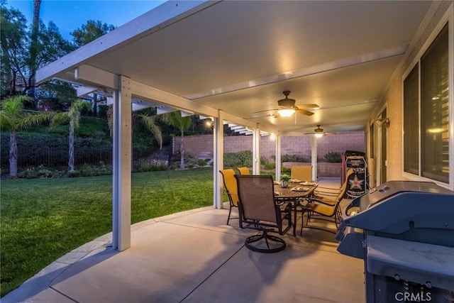 view of patio featuring ceiling fan