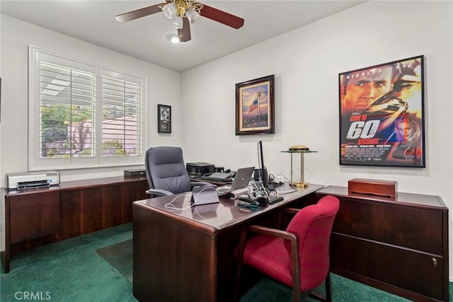 carpeted home office with ceiling fan