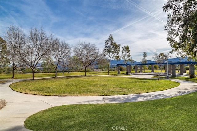 view of home's community featuring a yard