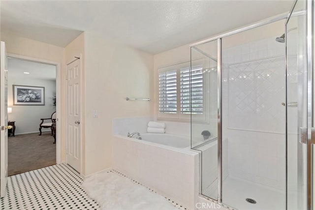 bathroom with independent shower and bath