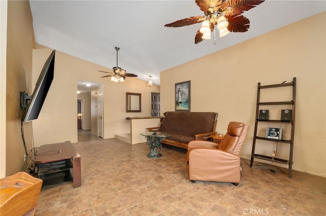 living room with ceiling fan and lofted ceiling