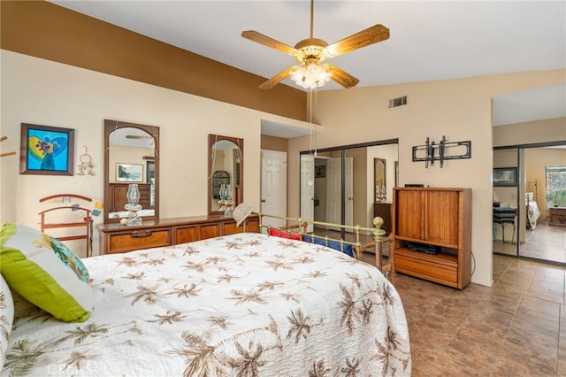 bedroom with vaulted ceiling and ceiling fan