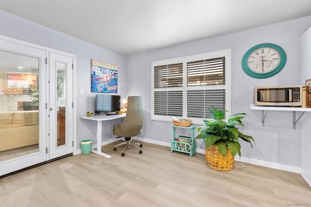 office area featuring light wood-type flooring