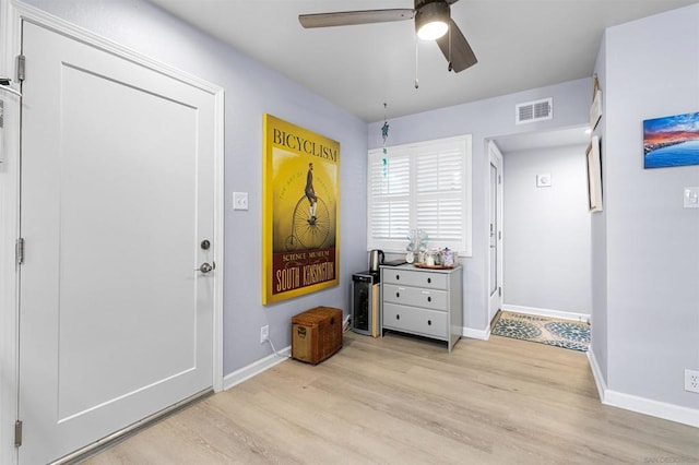 entryway featuring ceiling fan and light wood-type flooring