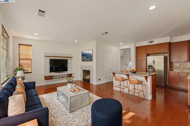 living room with dark wood-type flooring